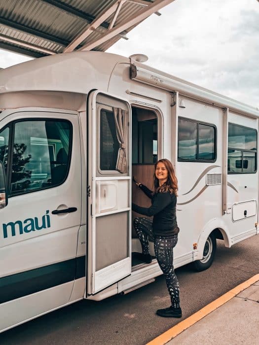 Helen stepping into a Maui Motorhome on her Tasmania itinerary, Australia