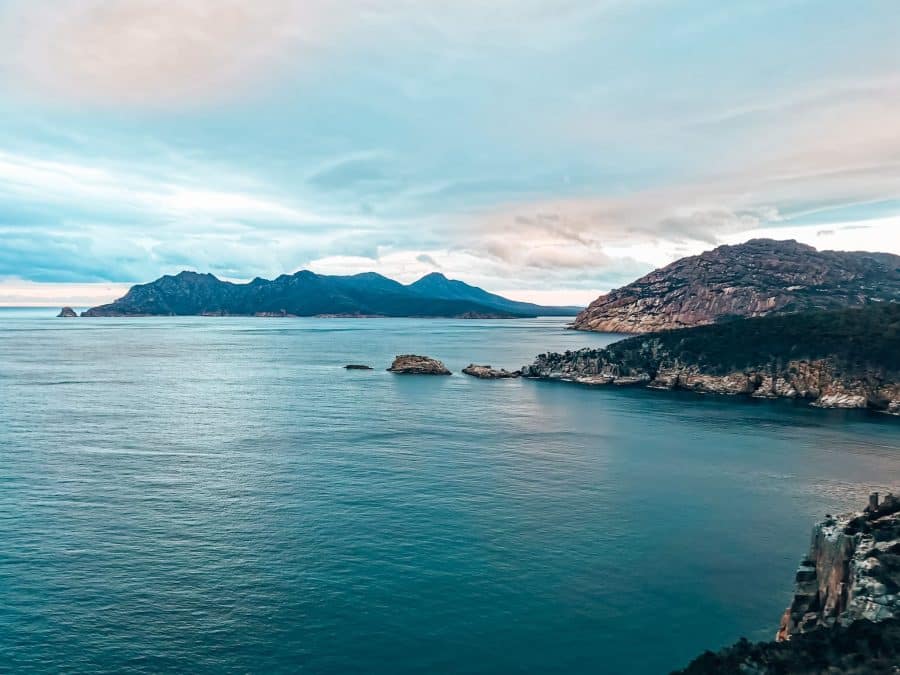 Rocky outcrops over the ocean at Cape Tourville Lighthouse, Freycinet National Park, Tasmania, Australia