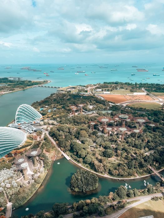 Looking over Gardens by the Bay and out to the ocean from the top of Marina Bay Sands, Singapore