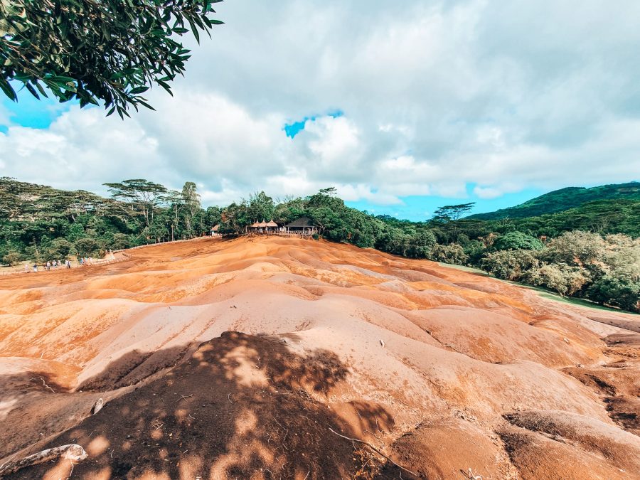 The unique Seven Coloured Earths made up of purples, reds and oranges surrounded by lush forest in Chamarel is one of the most unique activities in Mauritius