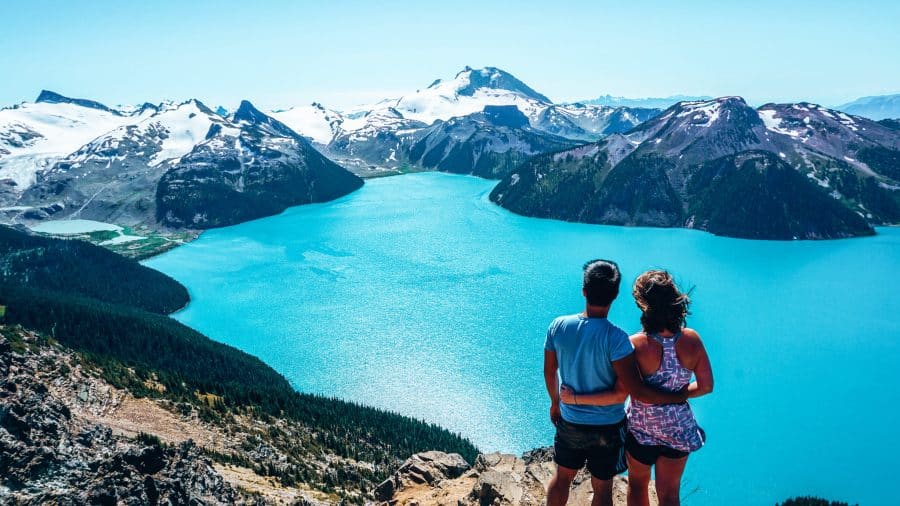 Helen and Andy overlooking the turquoise water of Garibaldi Lake at Panorama Ridge, Garibaldi Provincial Park, Whistler, British Columbia, Canada