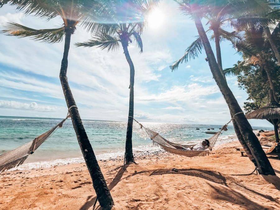 Andy lying in a hammock on La Plage Coden at The Oberoi, Mauritius