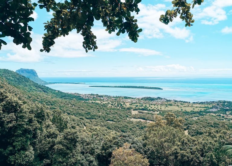 The incredible view from Le Chamarel Restaurant over the lush interior of Mauritius out to the striking turquoise Indian Ocean