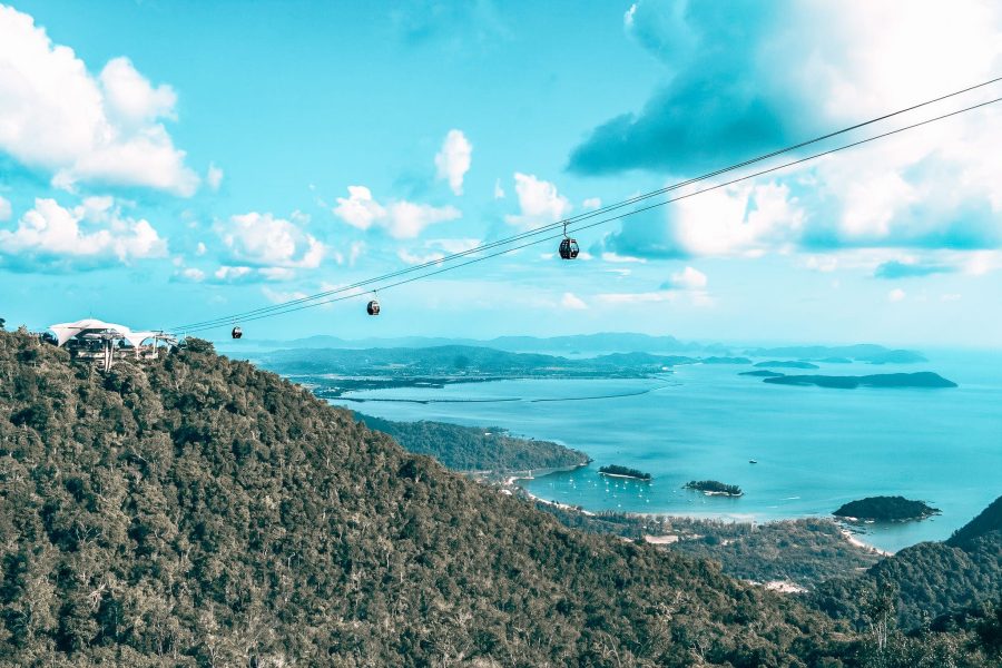 Langkawi Cable Car elevated above tropical mountain scenery with the ocean in the distance, Malaysia