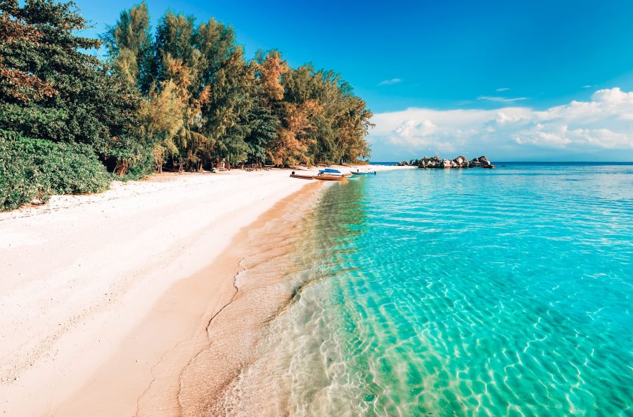 Turquoise ocean, palm-fringed lined beaches and tropical interior of the Perhentian Islands is one of the most amazing places to visit in Malaysia