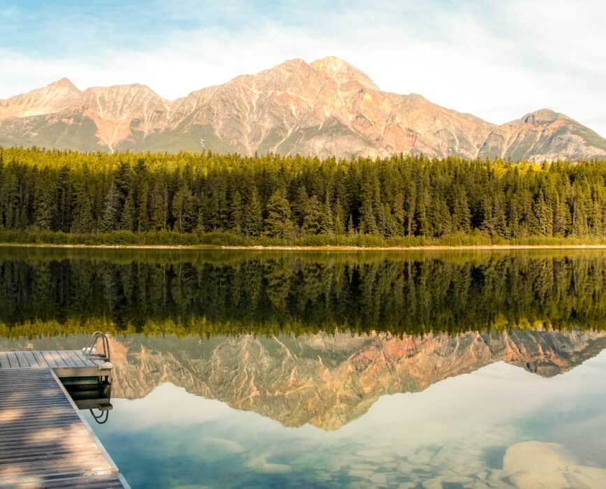 Breathtaking reflection of Pyramid Mountain, Jasper on your Calgary to Vancouver road trip