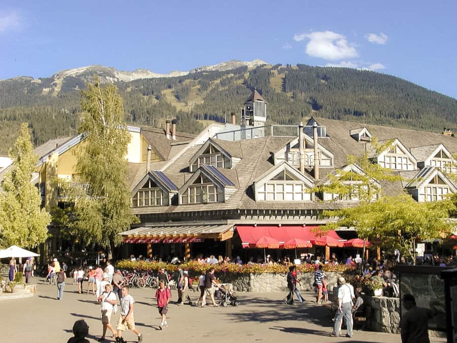 The picturesque Whistler Village with the mountains towering above it