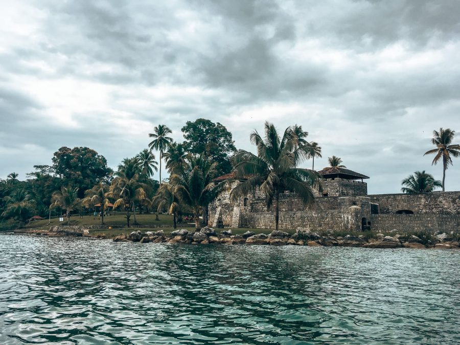 The Castillo de San Felipe surrounded by greenery on Lake Izabel, Rio Dulce National Park, Guatemala