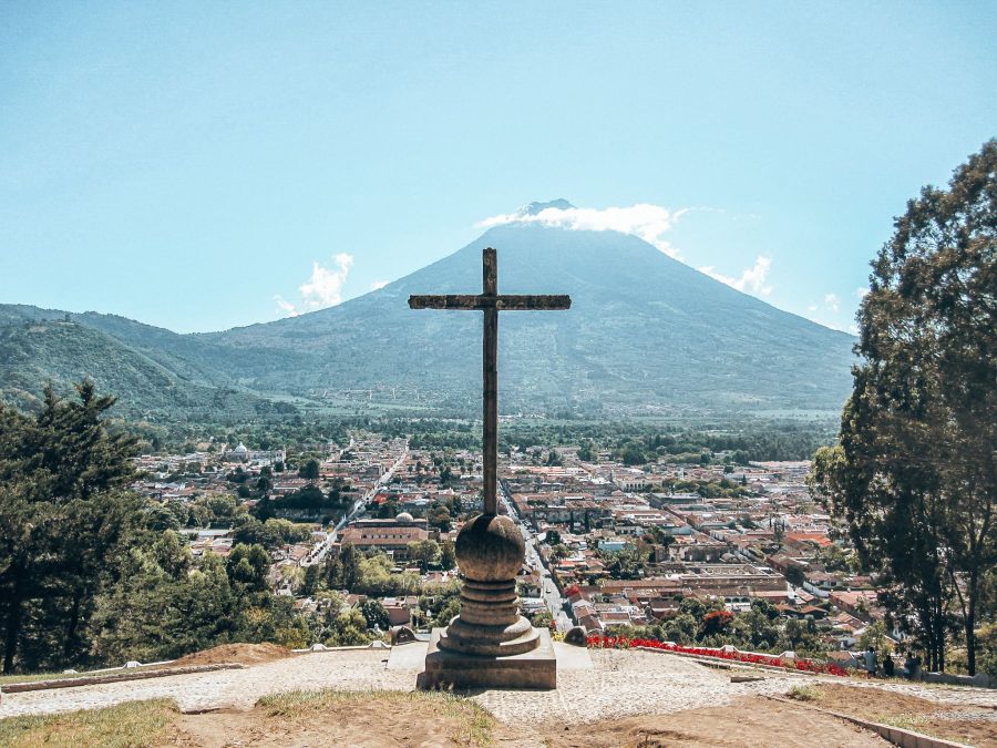 The view from Cerro de la Cruz over Antigua and Volcan Agua towering above the town, Guatemala, Central America