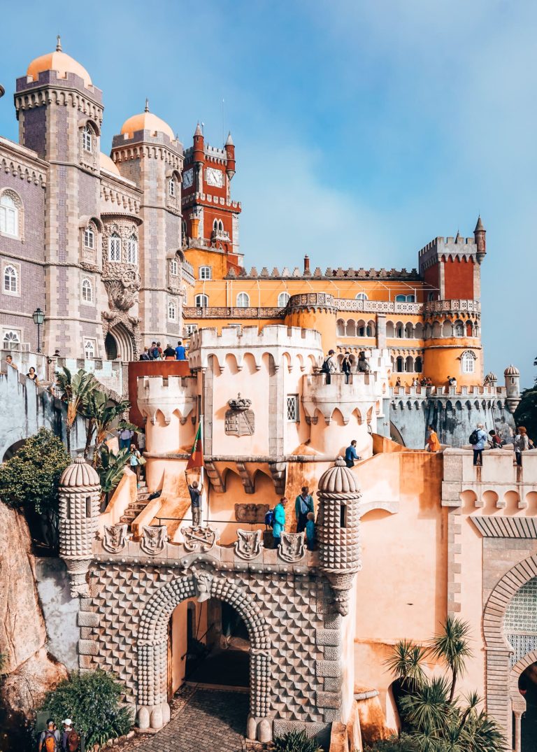 The extravagant Pena Palace painted in red and yellow, day trip to Sintra from Lisbon, Portugal