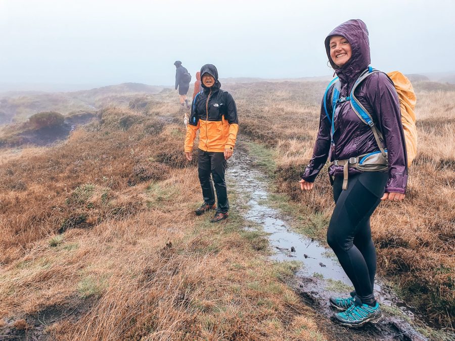 Andy and Helen in the bogs on Kinder Scout drenched from the rain, Peak District