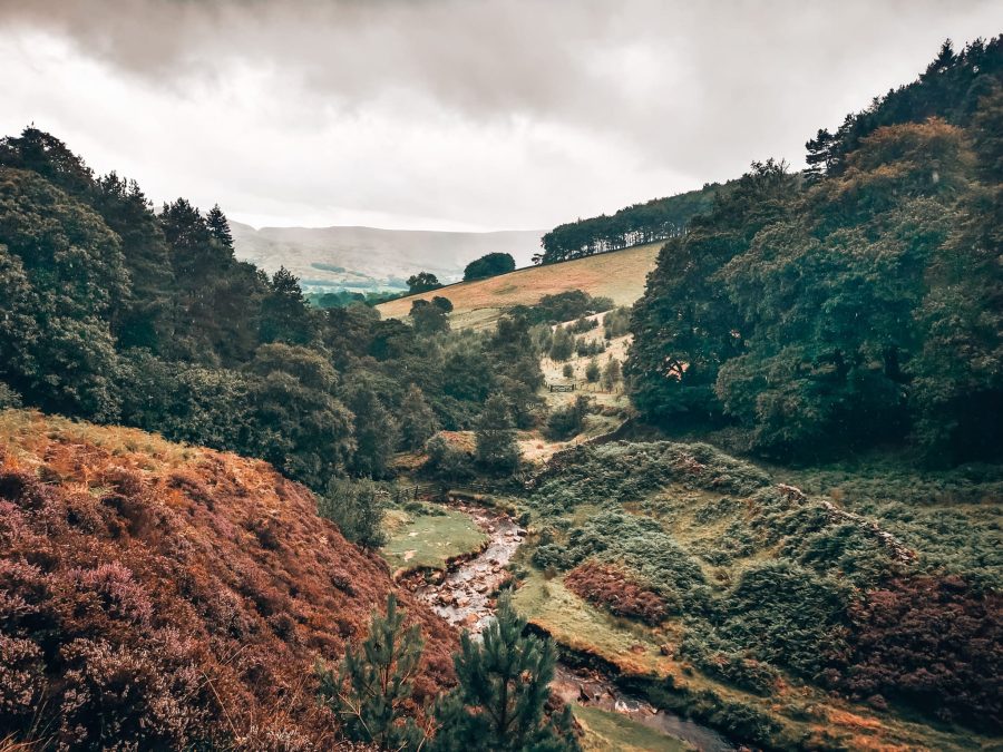 Beautiful views across the valley as we hike up Kinder Scout, one of the best things to do in the Peak District, Derbyshire