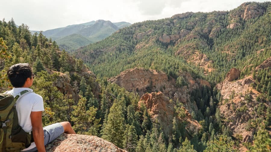 Andy looking out into the distance at Broadmoor Seven Falls, Colorado Springs, USA