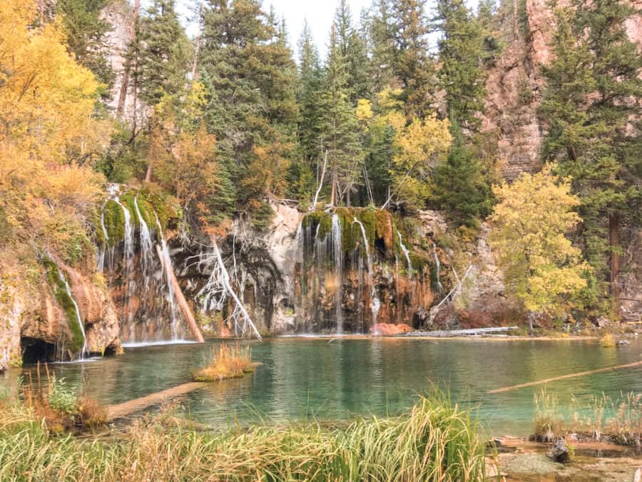 The turquoise waters and golden fall colours of Hanging Lake, Glenwood Springs was one of our favourite stops on our Colorado road trip, USA