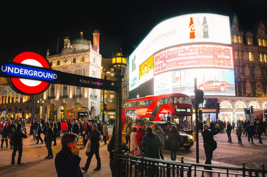 Busy streets and bright lights of Piccadilly Circus, London, England, UK