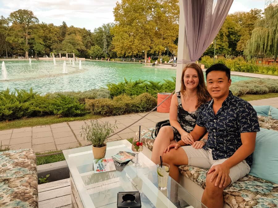 Sitting by the singing fountains in the lake in Tsar Simeon Central Garden, Plovdiv, Bulgaria