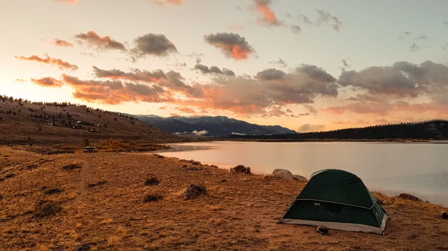 Tent set up overlooking Twin Lakes at sunset, our favourite camping stop on our Colorado road trip, USA