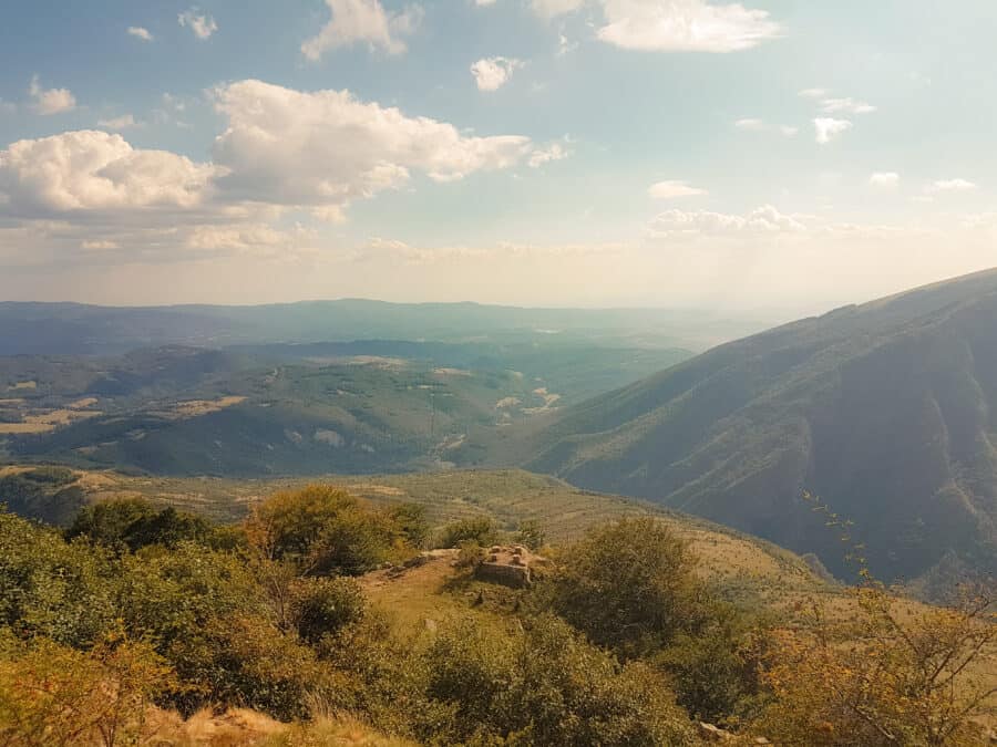 View from part way up Botev Peak over Kalofer and the surrounding countryside, one of the best places to visit Bulgaria