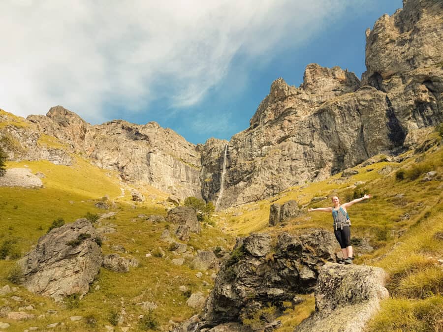 Helen stood underneath Raiskoto Praskalo Waterfall on Botev Peak, Kalofer is one of the most incredible places to visit Bulgaria