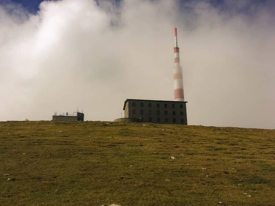 Station at the top of Botev Peak shrouded in thick cloud, Kalofer, Bulgaria