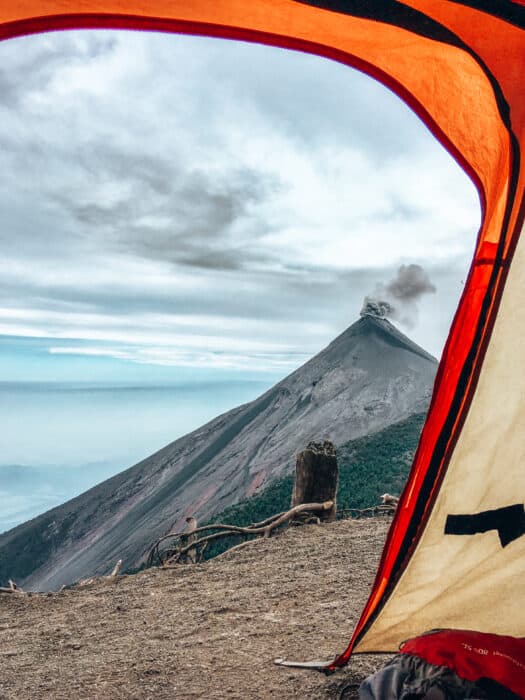 View from inside my tent on Volcan Acatenango with Volcan Fuego erupting outside, Antigua, Guatemala