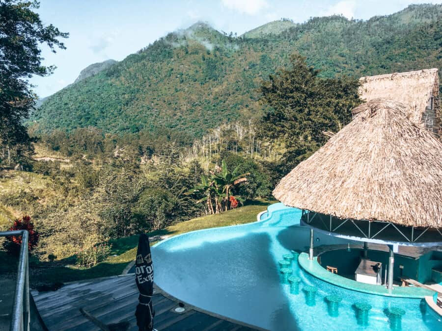 On your Guatemala itinerary, get yourself into an infinity pool overlooking the lush tropical jungle of Lanquin, Guatemala