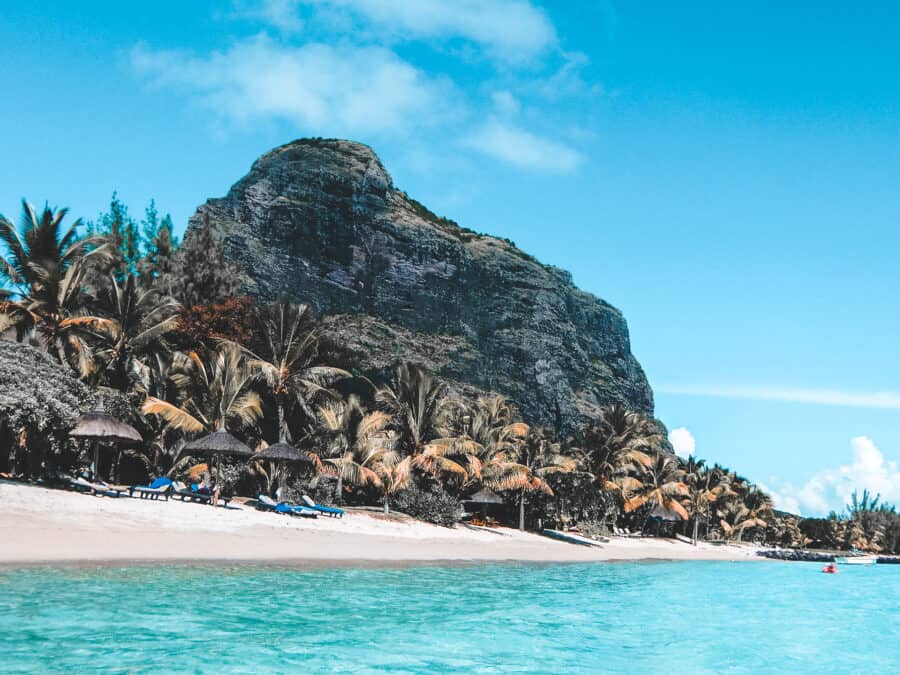 The beautiful white sand and dramatic backdrop of Le Morne Brabant is one of the top reasons to visit Mauritius