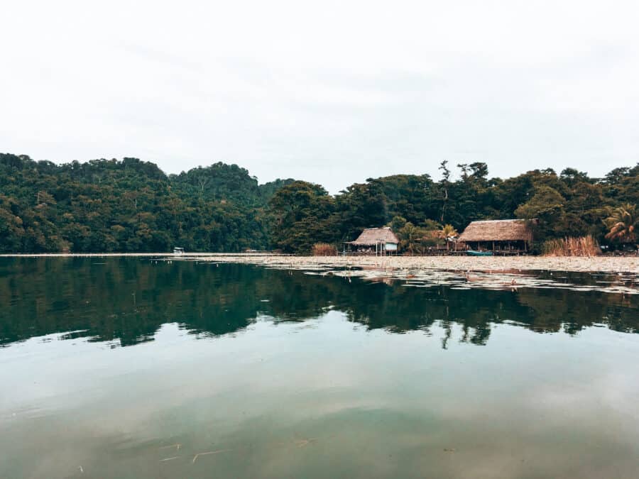 Small Q'eqchi villages in the heart of Rio Dulce National Park on the river surrounded by thick jungle on your way to Livingston on your Guatemala itinerary