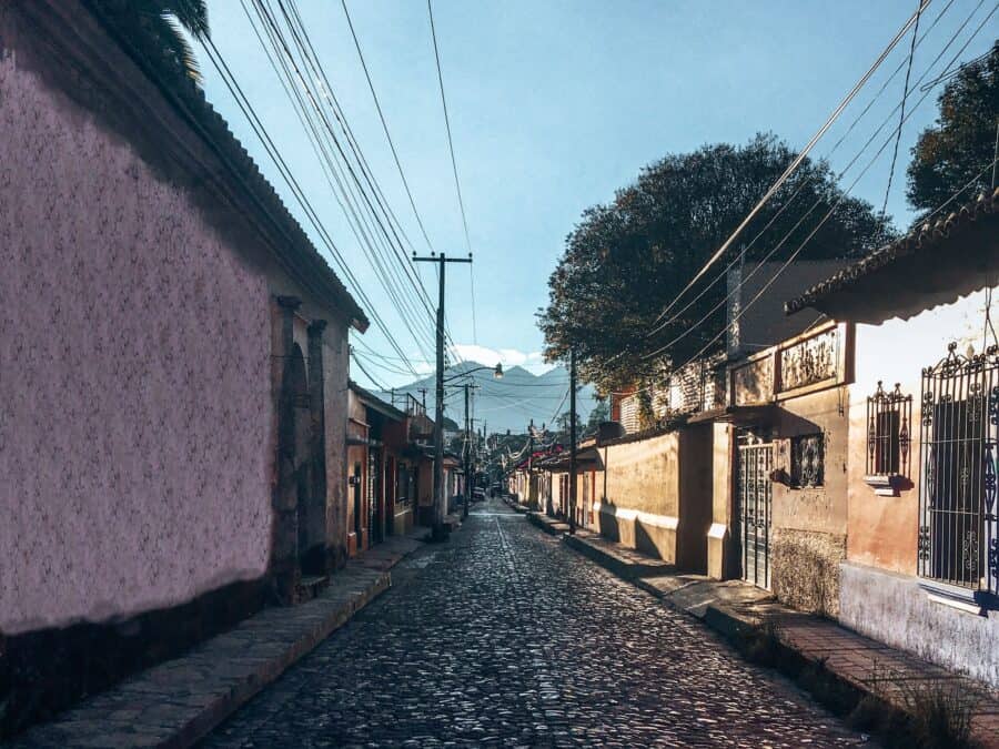 Colourful cobbled streets of San Cristobal de las Casas with mountains in the background, Chiapas, Mexico