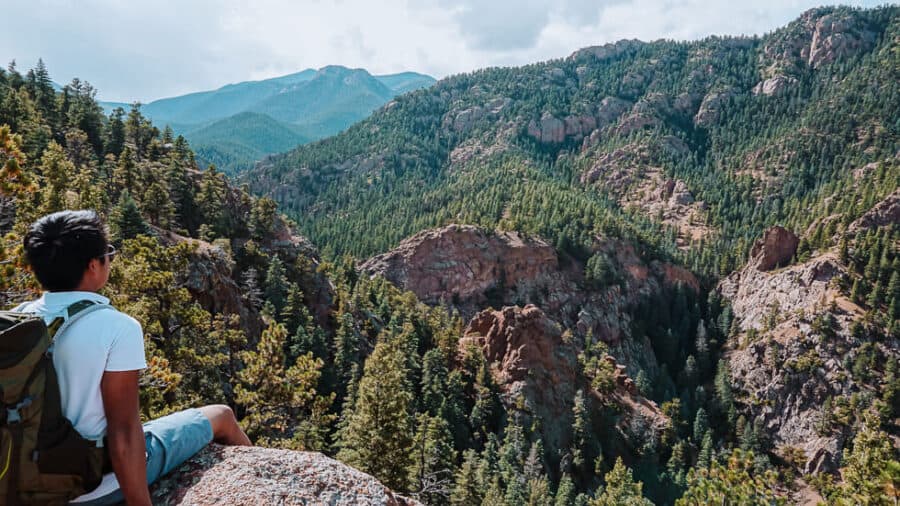 Hiking trails with panoramic views over the surrounding mountains at the Broadmoor Seven Falls, Colorado