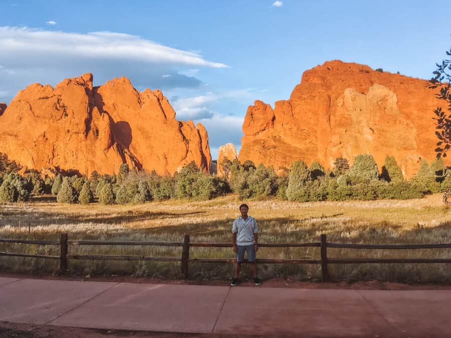 Andy stood under the towering red rocks at the Garden of the Gods, Colorado