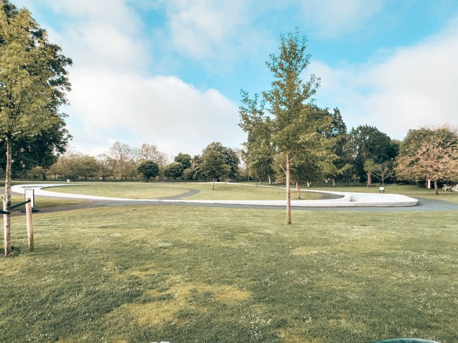 Diana Memorial surrounded by trees and grass in Hyde Park, London