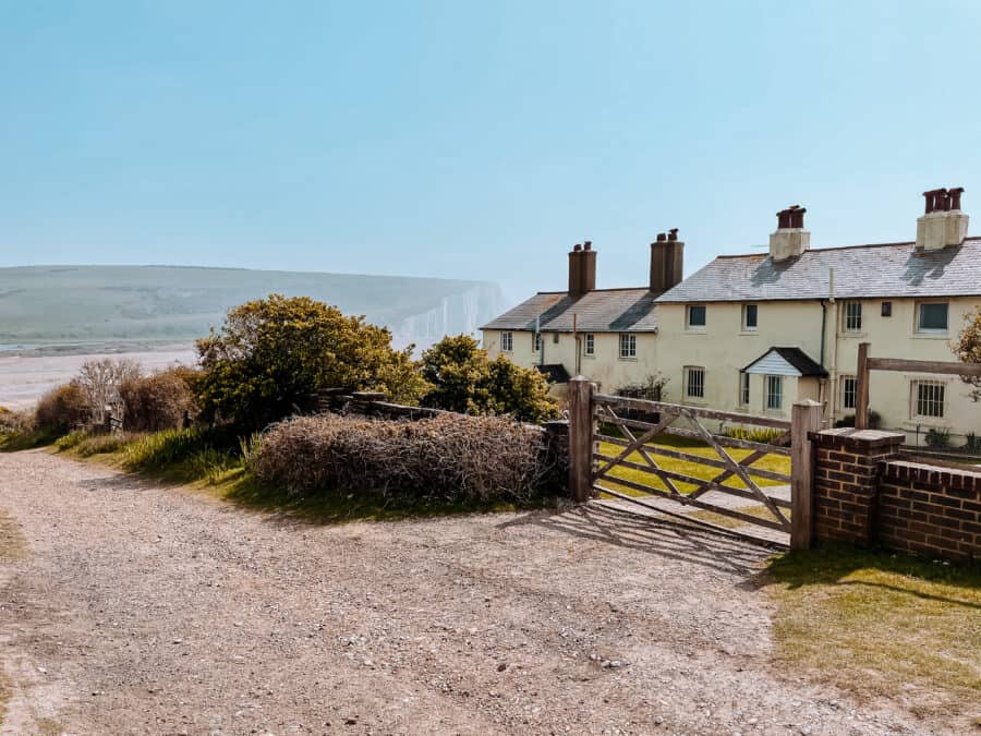 The spectacular view from the Coastguard Cottages at Cuckmere Haven to the iconic white cliffs on the Seven Sisters Walk, East Sussex