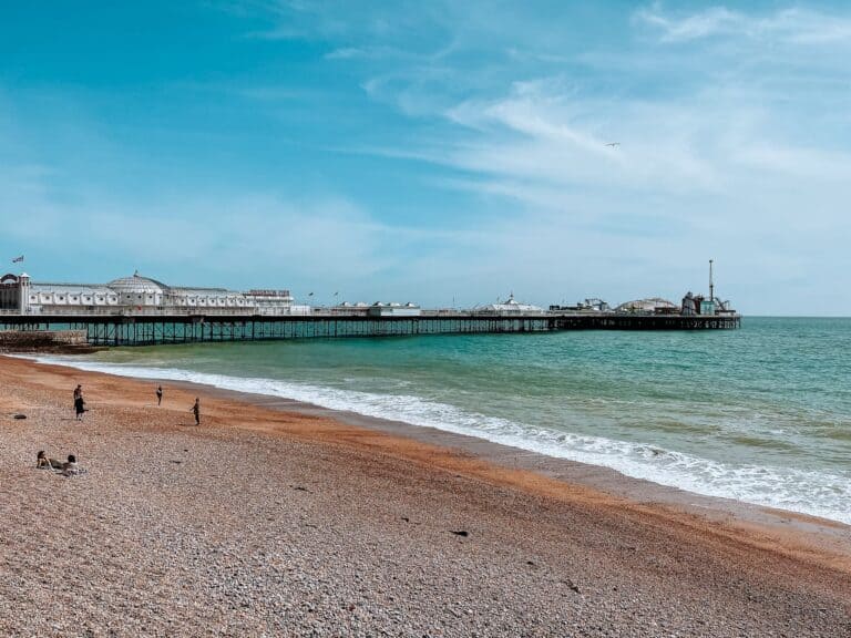 Brighton Palace Pier and Beach overlooking the turquoise ocean, Sussex