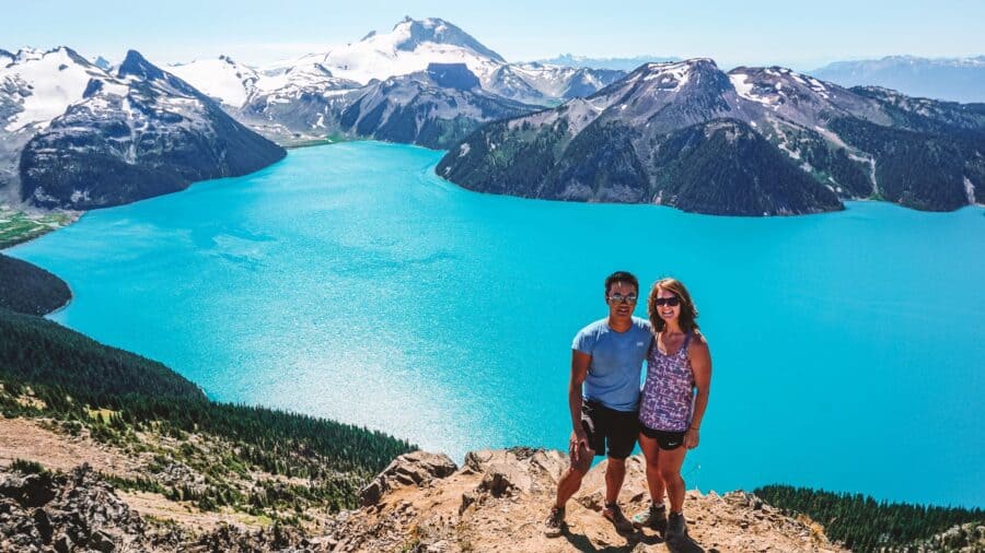 Andy and Helen overlooking the striking Garibaldi Lake from Panorama Ridge, one of the most beautiful hikes in Whistler, Canada