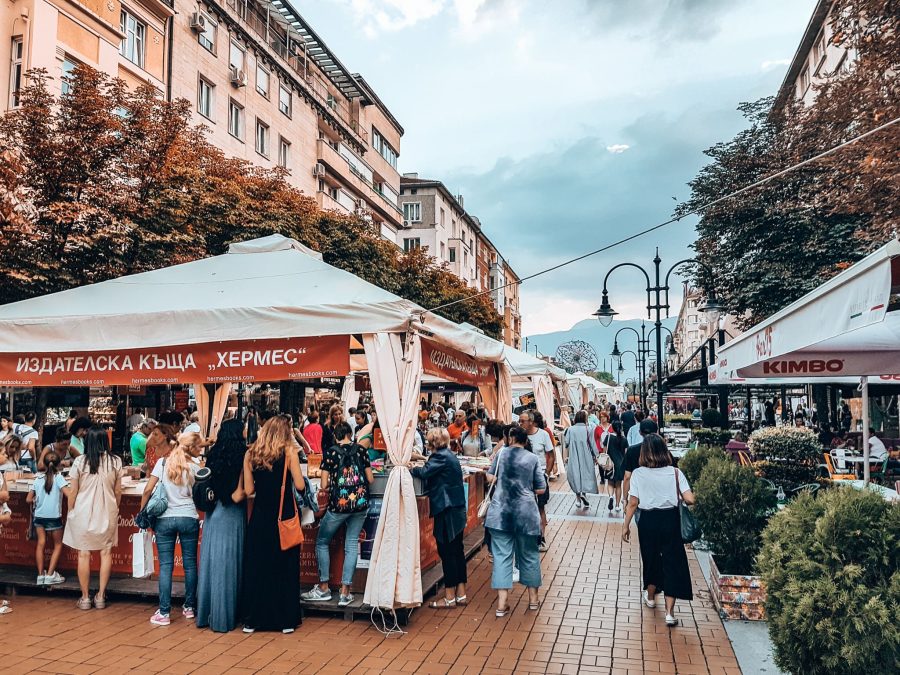 Market stalls lining Vitosha Boulevard with Vitosha Mountain towering in the background, Sofia, Bulgaria