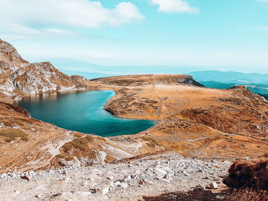 Kidney Lake shimmering under the sun surrounded by mountains, Seven Rila Lakes, things to do in Bulgaria