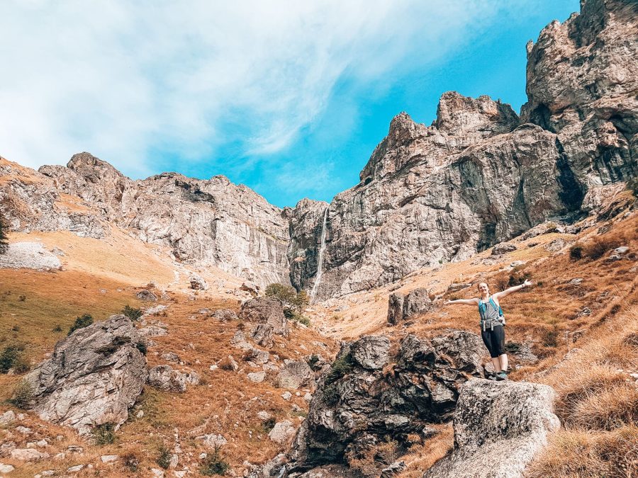 Helen stood in front of Raiskoto Praskalo Waterfall, Botev Peak, things to do in Bulgaria