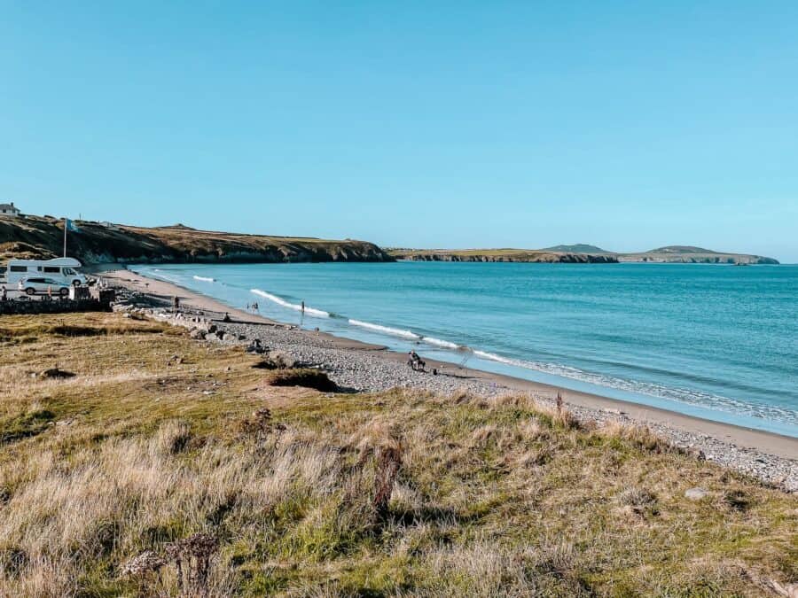 Visiting the long stretch of golden sand at Whitesands Bay is one of the best things to do on your 3 days in Pembrokeshire, Wales, UK