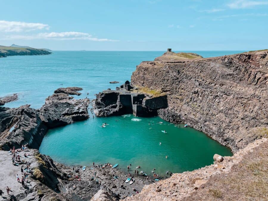 Looking down over the piercing turquoise Blue Lagoon at Abereiddy, Pembrokeshire, Wales, UK