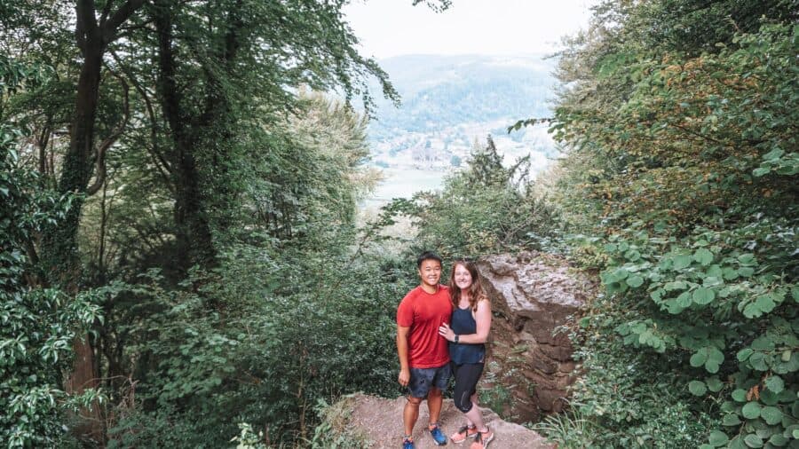 Andy and Helen stood at the Devil's Pulpit viewpoint overlooking Tintern Abbey, Offa's Dyke Path, Wye Valley, Wales, UK