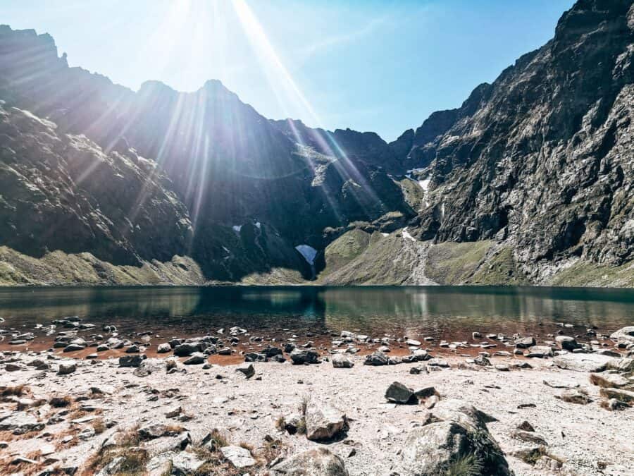 Hiking to Czarny Staw with a dramatic Tatra Mountain backdrop is one of the best things to do in Zakopane, Poland