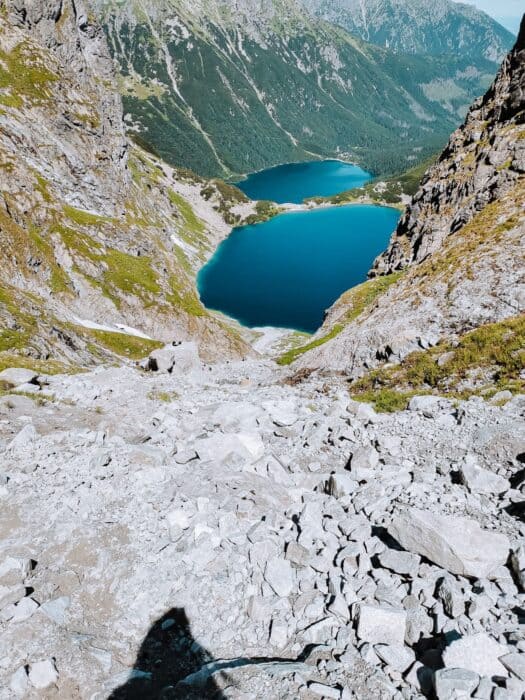 View over Czarny Staw and Morskie Oko as you hike Rysy Peak in the Tatra Mountains is one of the best things to do in Zakopane, Poland