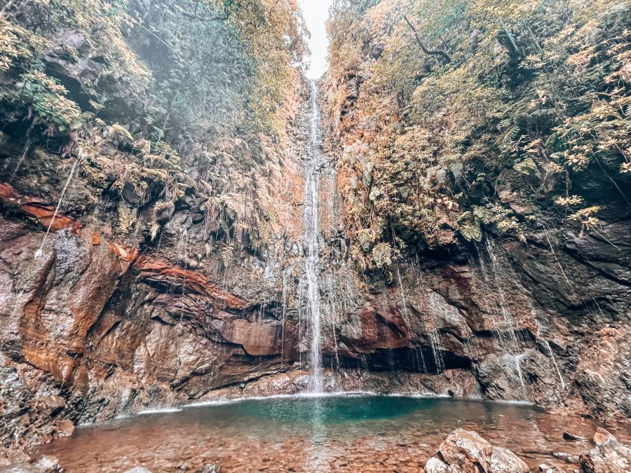 Levada das 25 Fontes and its weeping walls of water tumbling into the natural pool below is one of the top things to do in Madeira, Portugal