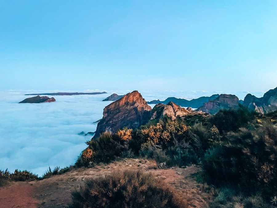 Jagged rocks of Madeira's Central Mountains protruding through the clouds, Pico do Arieiro to Pico Ruivo Hike, Best Things to do in Madeira