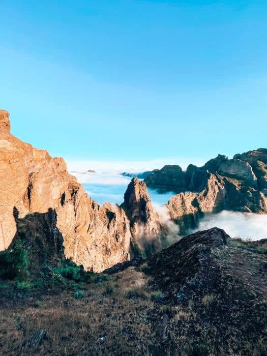 View from Pico do Arieiro with mountain peaks standing tall above the clouds, things to do in Madeira, Portugal