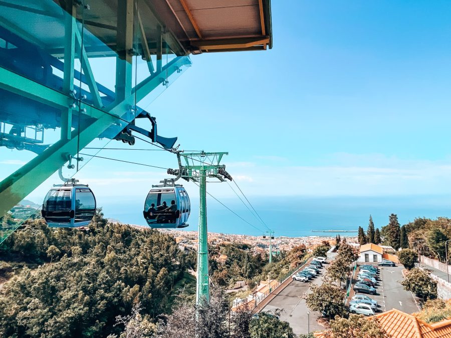 View from the top of the Funchal Cable Car over the red roofs and out to the Bay of Funchal, Madeira