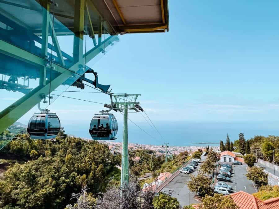 View from the top of the Funchal Cable Car over the red roofs and out to the Bay of Funchal, Madeira