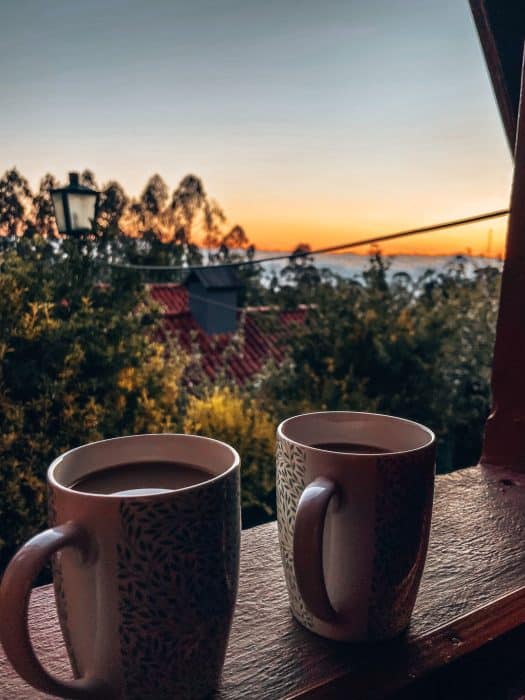 Sunrise above the clouds with our morning coffee in our Casas de Santana, Madeira, Portugal