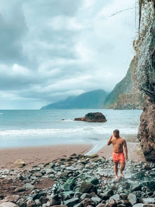 Andy in the waterfall at Seixal Beach, Madeira, Portugal